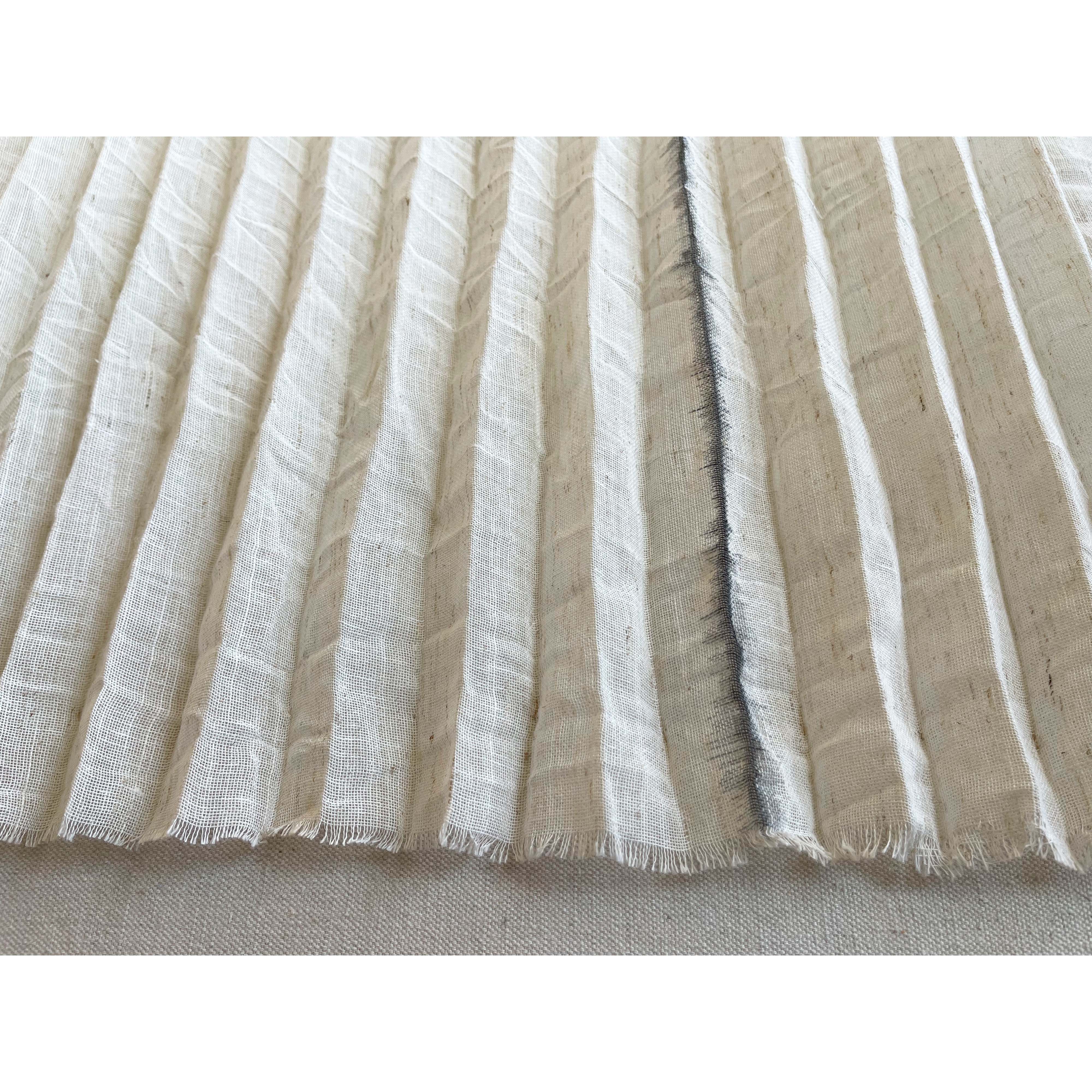 Plisado acordeón en lino